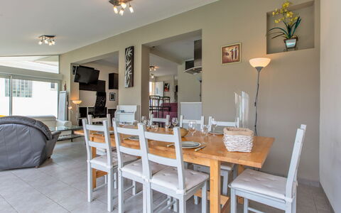 Les Baïnes: Table, Furniture, Property, Chair, Wood, Lighting, Picture Frame, Houseplant, House, Building