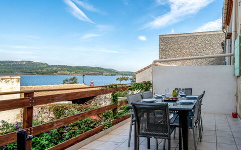 La Maison de L'Etang: Cloud, Sky, Water, Table, Building, Plant, Azure, Wood, Chair, Fence