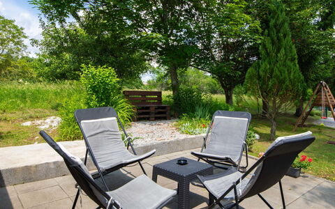 Tina: Plant, Furniture, Leaf, Chair, Tree, Shade, Outdoor Furniture, Wood, Interior Design, Grass