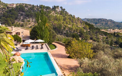 Santa Llucia: Swimming Pool, Property, Natural Landscape, Azure, Vacation, House, Tree, Estate, Summer, Sea
