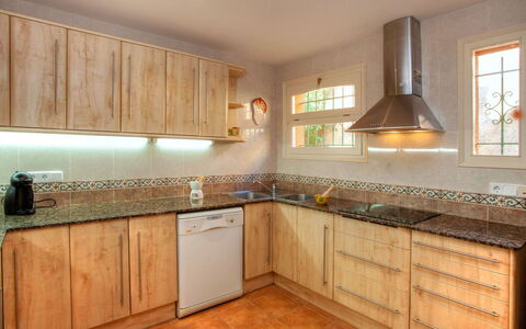 Gloria: Countertop, Cabinetry, Property, Kitchen, Room, Furniture, Building, Floor, Interior Design, Tile