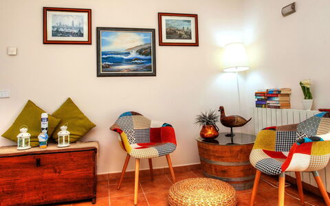 Gloria: Room, Interior Design, Furniture, Living Room, Property, Floor, Table, Wall, Orange, House