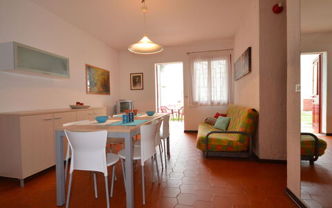 Lignano Sabbiadoro 642: Furniture, Window, Table, Wood, Chair, Orange, Interior Design, Building, Flooring, Floor