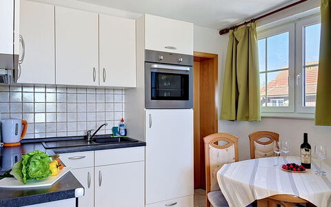 Fip-Ferienpark (Insel Poel): Major Appliance, Interior Design, Kitchen, Sink, Kitchen Appliance, Plumbing Fixture, Countertop, Tap, Flooring, Furniture