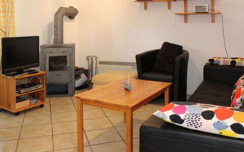 Villa Meike (Insel Poel): Room, Furniture, Property, Living Room, Interior Design, Table, Building, Coffee Table, Floor, House