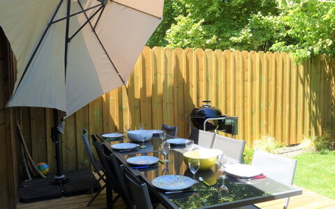 Le Chant des 4 Sirènes: Table, Plant, Furniture, Property, Chair, Building, Shade, Outdoor Table, Umbrella, Outdoor Furniture