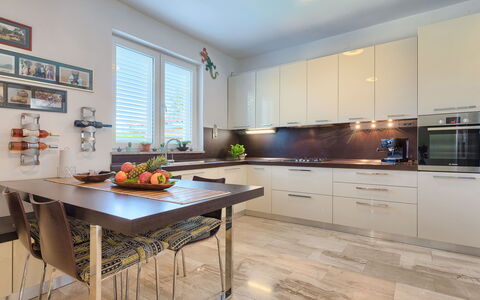 Salamander: Countertop, Furniture, Cabinetry, Property, Table, Wood, Kitchen, Interior Design, Window, Flooring