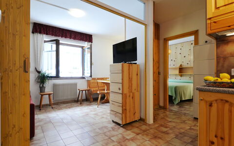 Canazei 510: Furniture, Property, Cabinetry, Picture Frame, Interior Design, Wood, Plant, Table, Houseplant