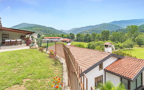 Casa Amica: Sky, Plant, Cloud, Building, Window, Green, Mountain, Tree, Wood, House