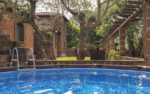 Casale di Befania: Water, Plant, Property, Building, Nature, Azure, Swimming Pool, Lighting, Tree, Window