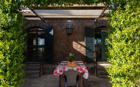 Casale di Befania: Plant, Plant Community, Building, Window, Yellow, Cottage, Shade, Grass, Outdoor Furniture, Leisure