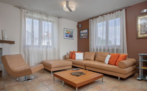 Villa Asi: Furniture, Table, Picture Frame, Couch, Window, Wood, Studio Couch, Interior Design, Chair, Building