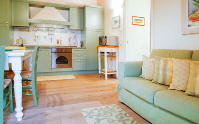Casetta Olivo (Mlu151) 604.1: Room, Furniture, Living Room, Property, Floor, Interior Design, Turquoise, Building, House, Yellow