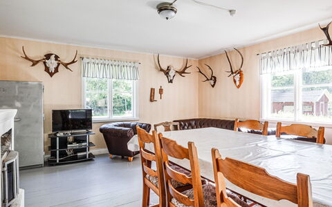 Mjöshult: Property, Furniture, Table, Wood, Window, Picture Frame, Lighting, Interior Design, Floor, Couch