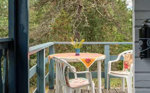 Boda Åsen Jaktstugan: Property, Plant, Porch, Wood, Shade, Tree, Architecture, Interior Design, Table, Chair