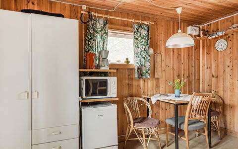 Boda Åsen Jaktstugan: Furniture, Cabinetry, Property, Building, Table, Chair, Wood, Interior Design, House, Floor