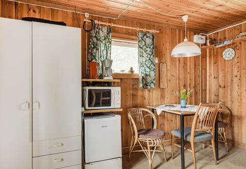 Boda Åsen Jaktstugan: Furniture, Cabinetry, Property, Building, Table, Chair, Wood, Interior Design, House, Floor