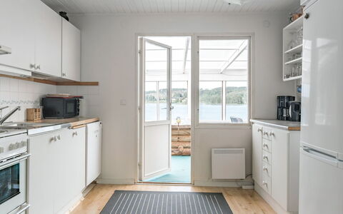 Uskeboda: Cabinetry, Countertop, Building, Kitchen, Kitchen Appliance, Kitchen Stove, Home Appliance, Wood, Interior Design, Flooring