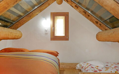 Rustico Andrea: Attic, Room, Property, Bedroom, Furniture, Bed, Ceiling, Beam, Building, House