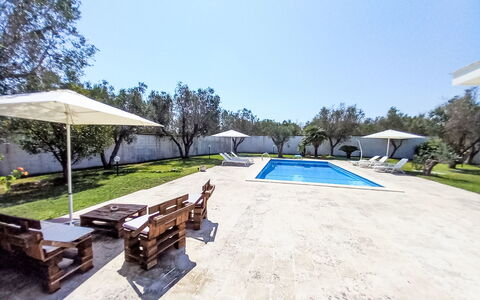 Giusy: Swimming Pool, Resort, Shade, Estate, Outdoor Furniture, Landscaping, Hacienda, Design, Sunlounger, Flagstone