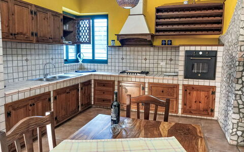 Giusy: Kitchen, Countertop, Interior Design, Furniture, Flooring, Cabinetry, Kitchen Appliance, Major Appliance, Wood, Ceiling