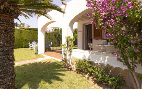 Villa Karoline: Plant, Building, Flower, Tree, Vegetation, House, Land Lot, Grass, Arecales, Landscape