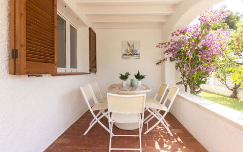Villa Karoline: Flower, Plant, Property, Houseplant, Building, Flowerpot, Table, Chair, Window, Wood