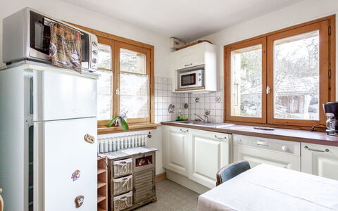 Saint Gervais 535: Room, Property, Furniture, Interior Design, Building, Kitchen, Yellow, Cabinetry, Floor, Home