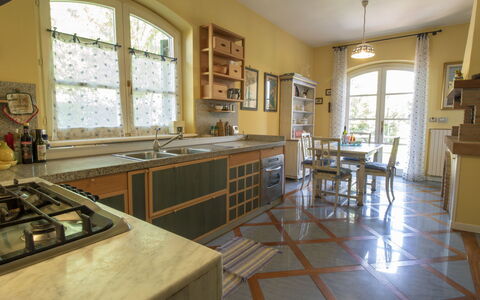 Nicoletta: Property, Countertop, Room, Building, Floor, Furniture, Kitchen, Yellow, Interior Design, House