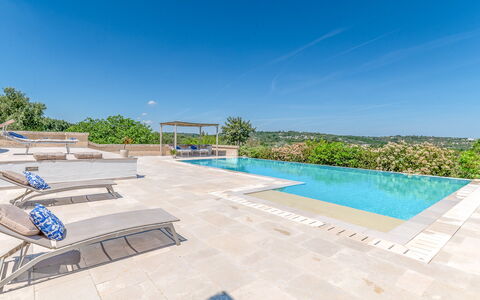 Villa Amelia Ostuni: Swimming Pool, Flagstone, Shade, Tile, Design, Landscaping, Water Feature, Resort
