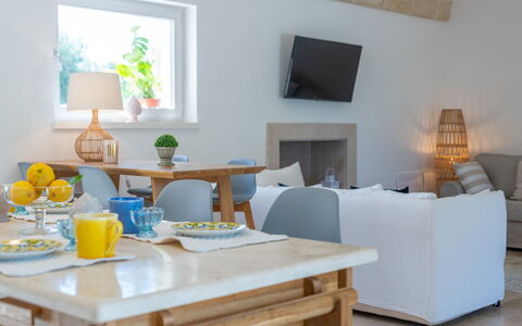 Villa Amelia Ostuni: Furniture, Interior Design, Table, Room, Chair, Couch, Tableware, Lighting, Home, Living Room