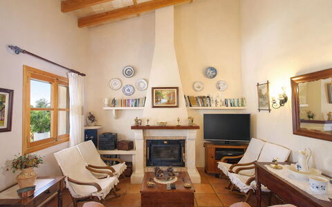 Mavi: Furniture, Interior Design, Wall, Flooring, Wood, Living Room, Couch, Ceiling, Room, Chair