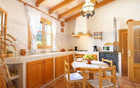 Mavi: Interior Design, Furniture, Flooring, Wood, Kitchen, Ceiling, Floor, Countertop, Cabinetry, Room
