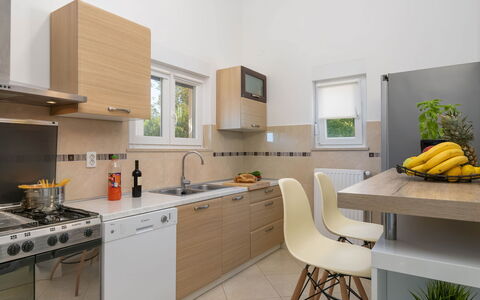 Casetta Filip: Room, Property, Countertop, Furniture, Kitchen, Cabinetry, Interior Design, Yellow, Building, House
