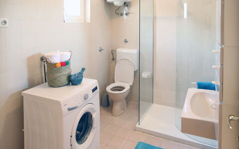 Nikica: Laundry Room, Property, Toilet Seat, Plumbing Fixture, Clothes Dryer, Toilet, Washing Machine, Bathroom, Building, Purple