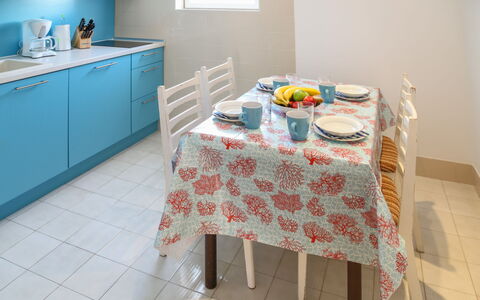 Nikica: Tablecloth, Room, Floor, Property, Furniture, Table, Textile, Tile, Turquoise, Linens