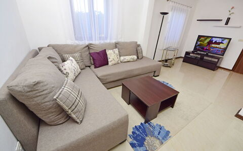 Sofija: Furniture, Room, Property, Living Room, Interior Design, Bedroom, Table, Purple, Floor, Couch