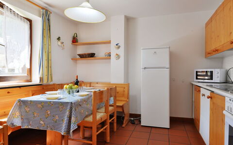 Cesa Palua: Room, Property, Furniture, Kitchen, Building, Floor, House, Interior Design, Table, Real Estate