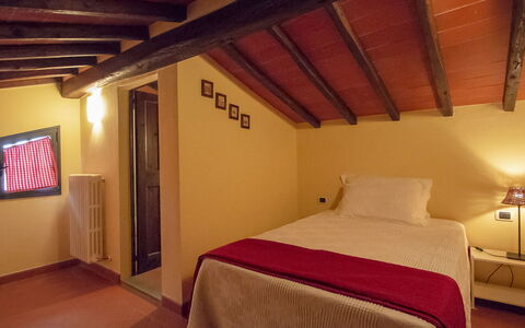 Podere: Bedroom, Room, Bed, Furniture, Property, Ceiling, Building, Interior Design, Attic, Bed Sheet