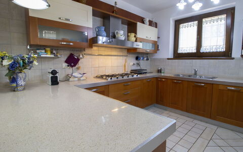 La Danza: Countertop, Room, Property, Kitchen, Cabinetry, Building, Furniture, Floor, Interior Design, Tile