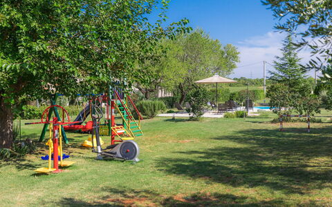 Bozac: Playground, Public Space, Swing, Tree, Grass, Outdoor Play Equipment, Lawn, Park, Yard, Backyard