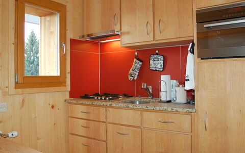 Villars 877: Cabinetry, Room, Kitchen, Furniture, Countertop, Property, Kitchen Stove, Cupboard, Plywood, House