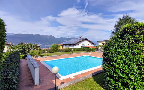Torre del Lago: Cloud, Plant, Water, Sky, Building, Property, Daytime, Azure, Tree, Swimming Pool