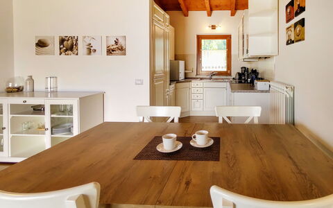 Torre del Lago: Table, Furniture, Property, Cabinetry, White, Wood, Chair, Kitchen, Living Room, Interior Design