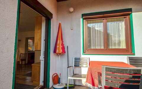 Laube: Property, Room, Red, House, Building, Wall, Home, Interior Design, Furniture, Architecture
