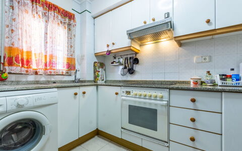 Solarium Iii: Laundry Room, Cabinetry, Property, Countertop, Clothes Dryer, Kitchen Stove, Kitchen, Washing Machine, Interior Design, Stove