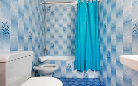 Villa Preciosa: Bathroom, Blue, Room, Property, Shower Curtain, Turquoise, Curtain, Interior Design, Aqua, Azure