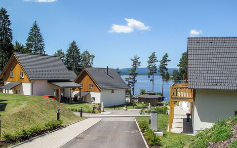 Lakeside Village 28 (+ Sauna): Plant, Sky, Cloud, Building, Property, Tree, Window, Road Surface, House, Land Lot
