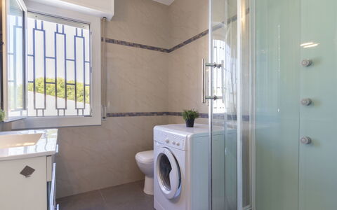 Regina: Room, Property, Laundry Room, Bathroom, Building, Major Appliance, Floor, House, Tile, Interior Design