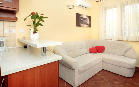 Stari Brist: Furniture, Room, Property, Interior Design, Living Room, Floor, Wall, Couch, Table, Building